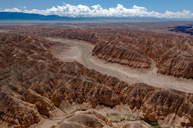 Discovering 6 Stunning Sights on Private Tour of Charyn Canyon - Moon Canyon’s color shift: burgundy to yellow at a slower pace (Location 3)